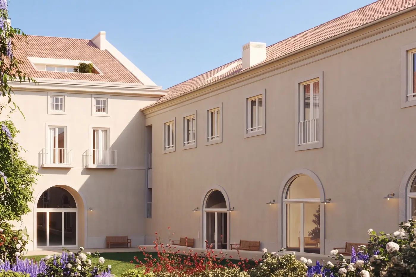 Visualisation of Cais / Balança from the planted courtyard: pale plaster walls, tiled roofs and arched ground-floor doors.